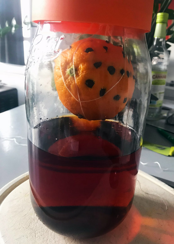 Recette rhum 44, une orange et du café dans un bocal